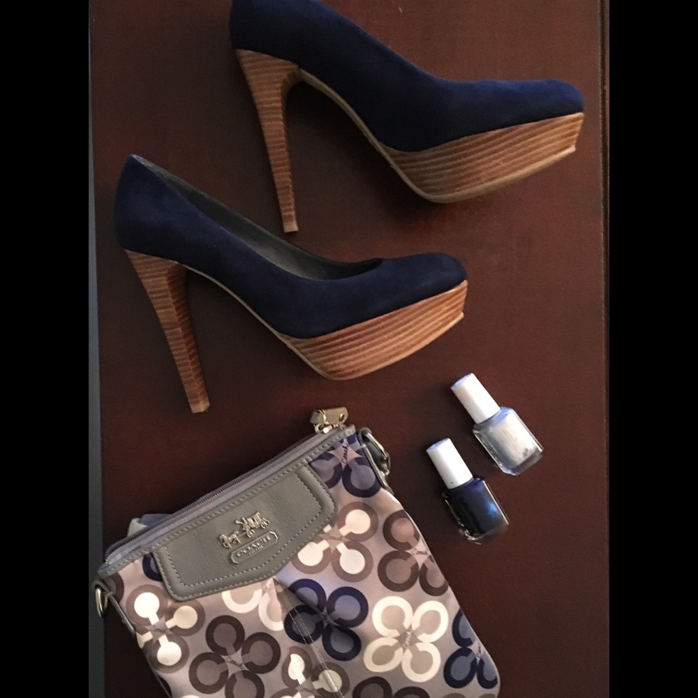 - Blue and gray Coach cross body bag